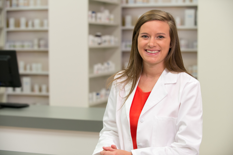 Pharmacist smiling at camera