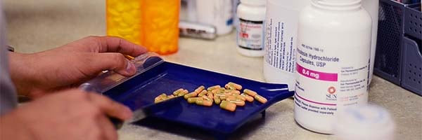 Pills being counted on tray