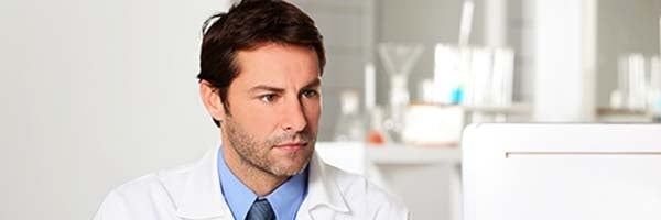 Pharmacist staring at something